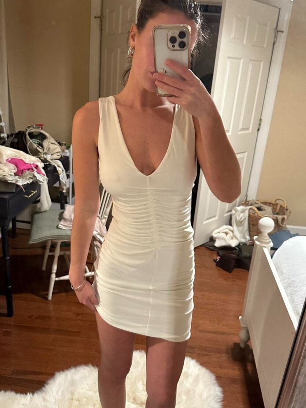 White bodycon mini dress with spiderweb cutout